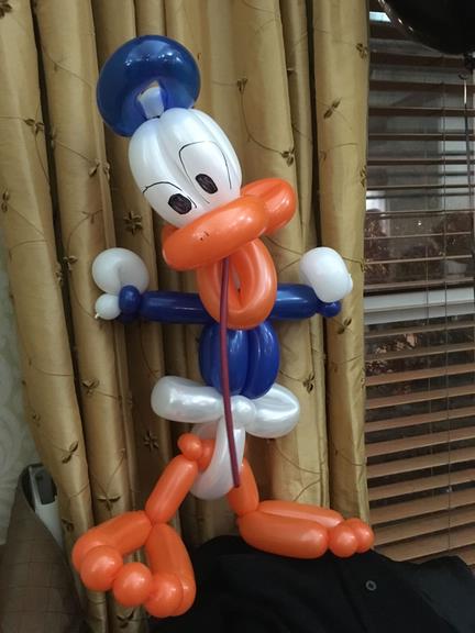 Face Painting Illusions and Balloon Art Image
